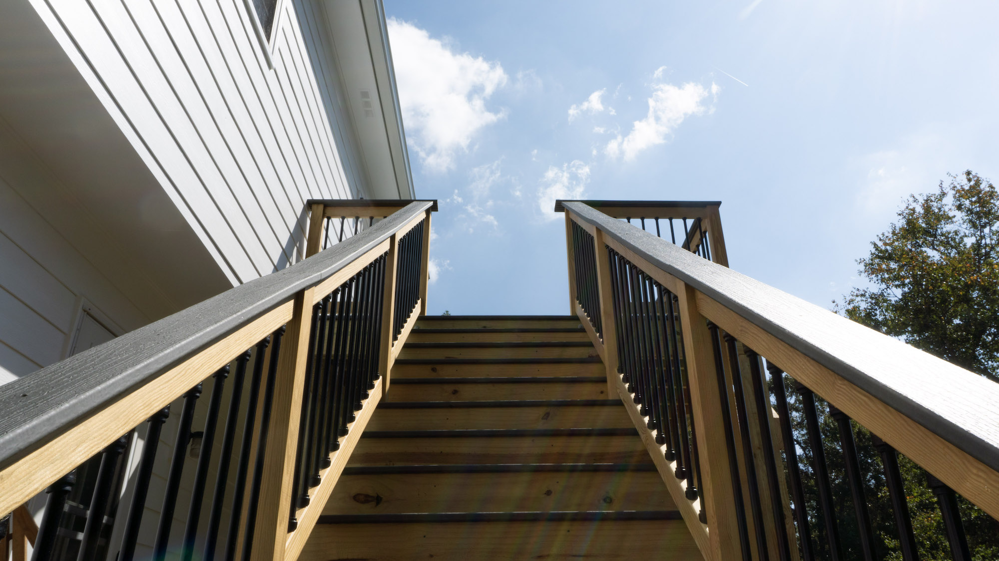 Deck & Porch Composite Decking Transformation by MAC Deck Builders